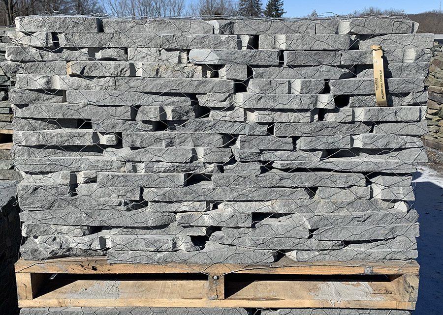 Picture of a full pallet of blue wall stone that is easy to work with