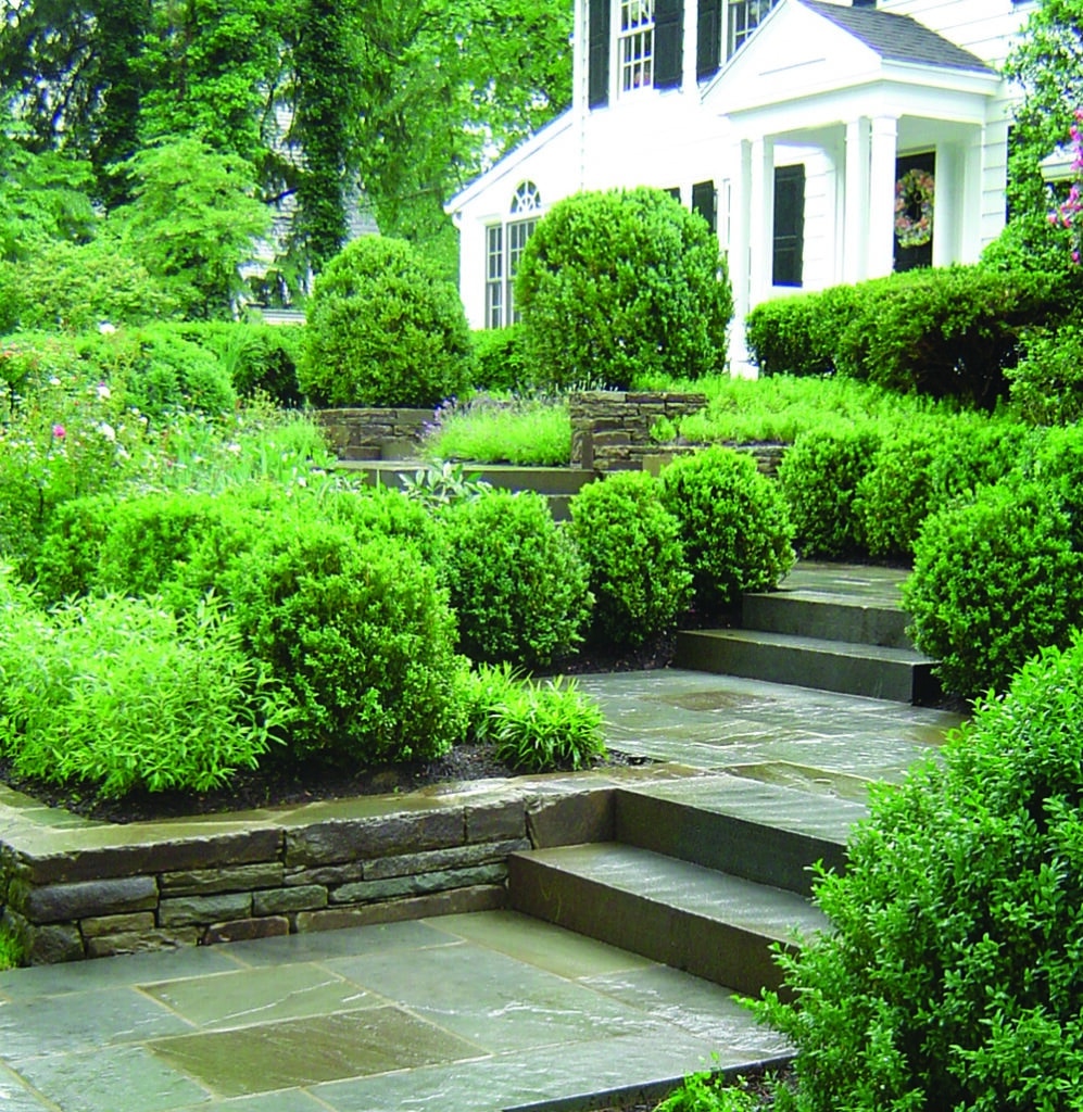 Dimensional bluestone steps with snapped Karney® wall stone. Photo courtesy of Todd Associates