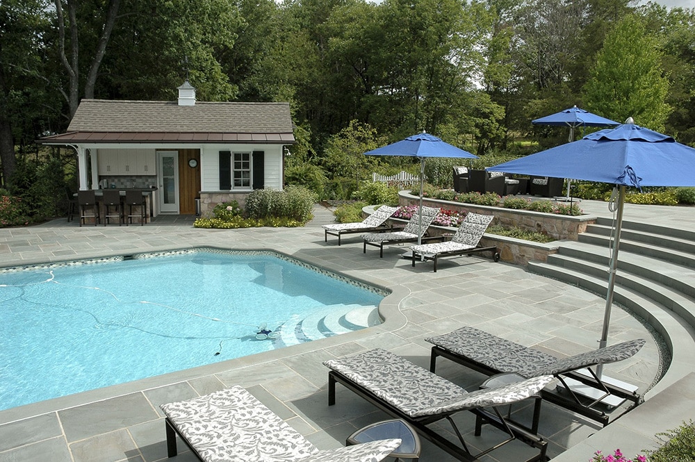 Select blue color bluestone sawn thermal pool deck. Photo Courtesy of btslandscaping.com, Masonry work by Viola Construction