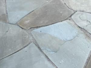 A close-up look of full color irregular bluestone in a nj walkway