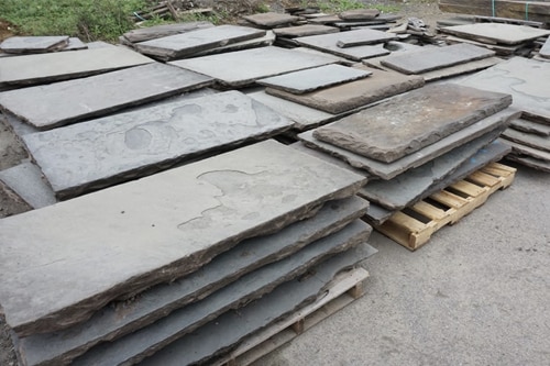 We frequently have reclaimed bluestone like these slabs in stock