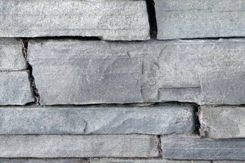 Example of a snapped bluestone wall