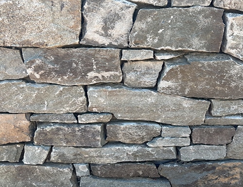PA fieldstone or PA colonial - they are the same stone - thin veneer building stone