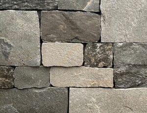 Sierra Ridge is a mix of darker and lighter colored thin veneer stone for fireplaces, kitchens and more