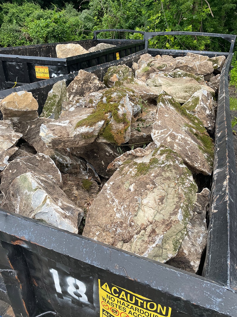 Boulders delivered in a container