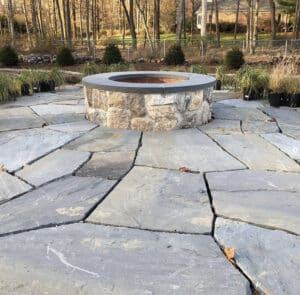 Circular top to a round fire-it using bluestone